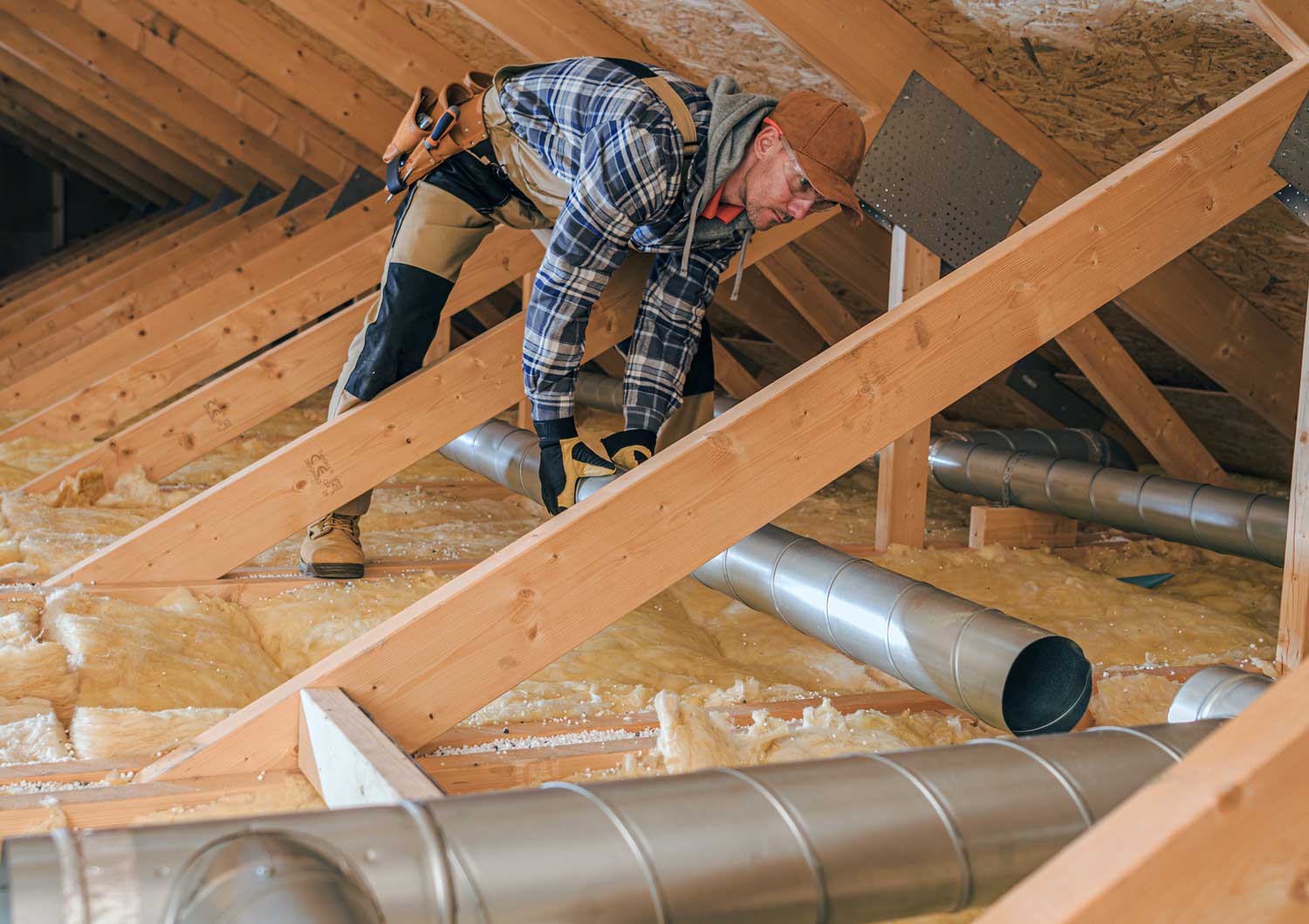 ductwork getting repaired by a technician