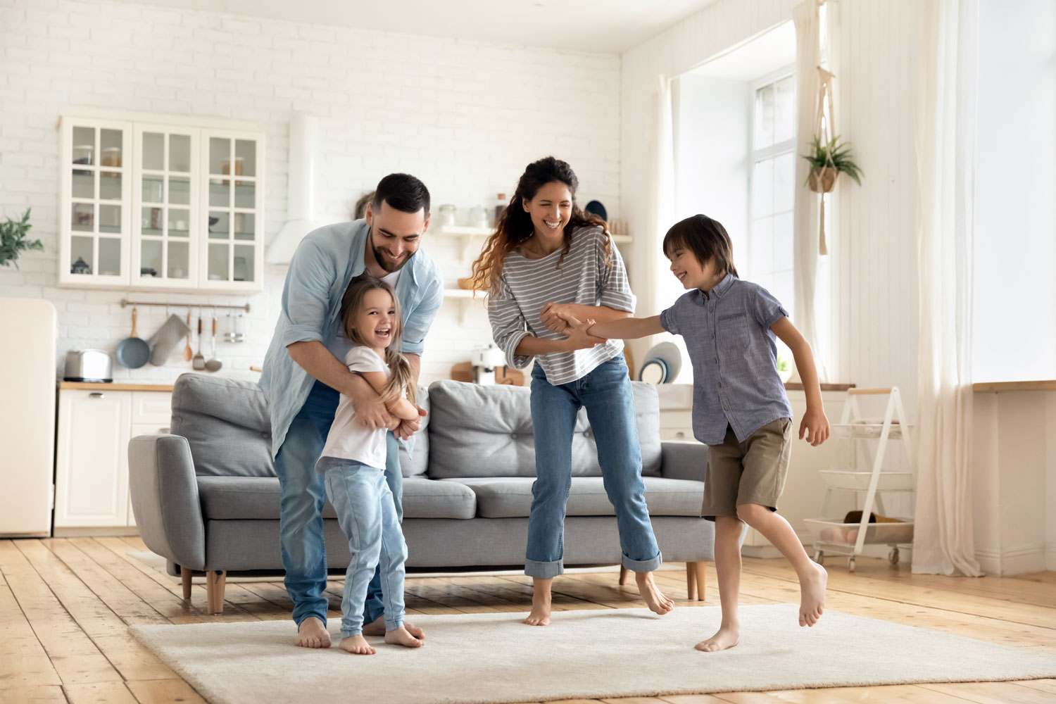 happy family laughing in living room
